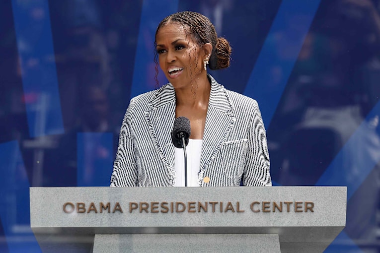 Michelle Obama masters monochromatic style in low-cut top and striking white ensemble
