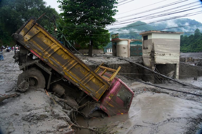 Catastrophic floods caused by a glacier collapse kill at least 273, with more than 1,300 missing