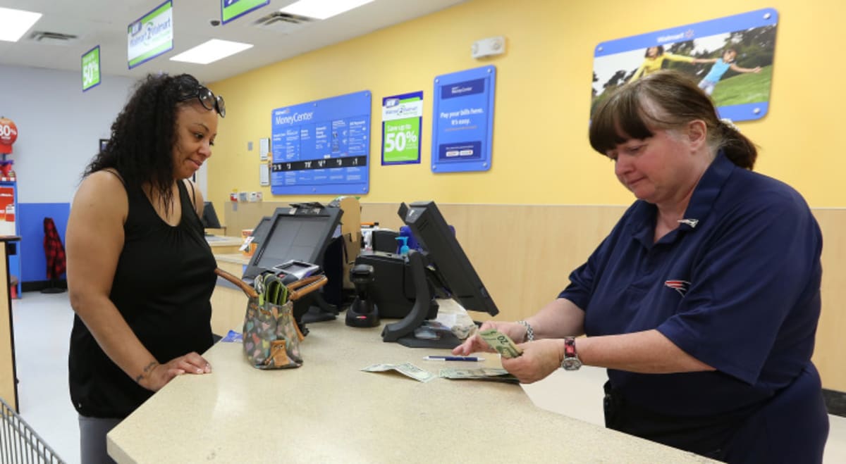 FTC mails $9.8 million to 65,000 people after accusing Walmart of failing to stop scammers from using its money transfers - AOL