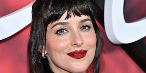 Dakota Johnson stuns in a Calvin Klein skirt and top adorned with $61K worth of diamonds
