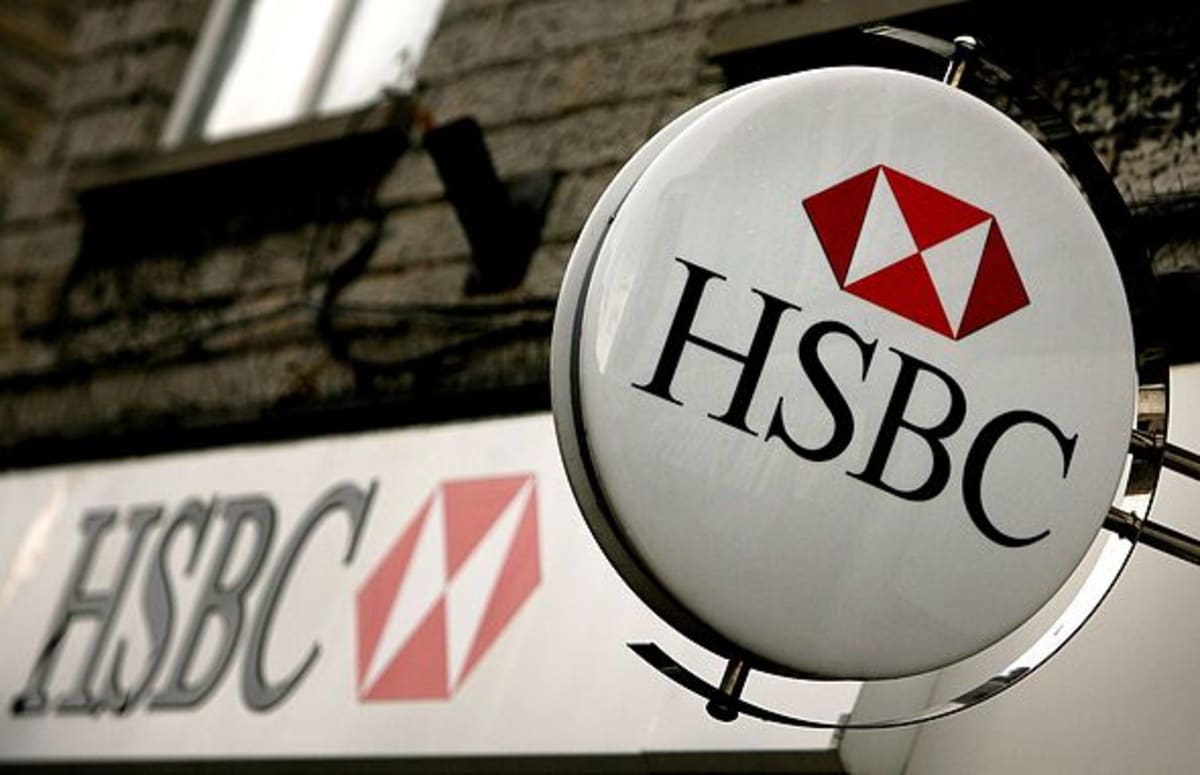 HSBC profits surge by a third as bank mulls huge job cuts
