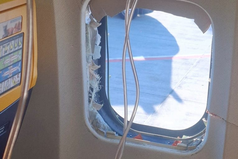 Ryanair crew failed to help passenger almost sucked out of window