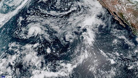 Lala is again a tropical storm, sending drenching rain and winds across the Hawaiian islands
