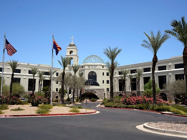 A toddler was found in a pool and declared dead. He's alive and his parents could be charged
