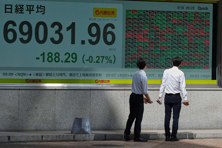 Asian shares slip as worries about rising oil prices offset boost from strong earnings