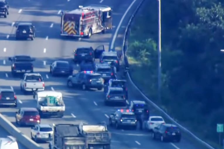 Armed man holds pregnant woman hostage while hitting 8 cars on the highway during rush hour car chase, police say