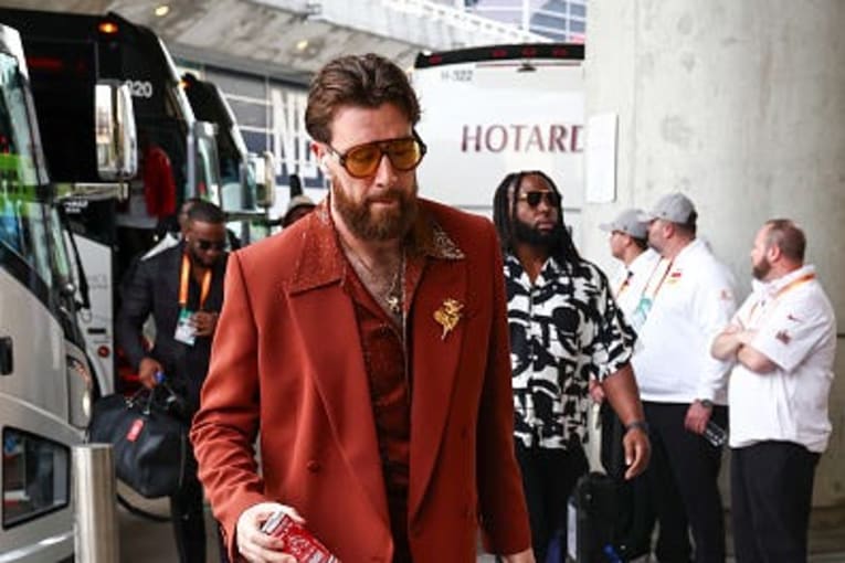 Travis Kelce marries Taylor Swift in a tux by Christian Dior