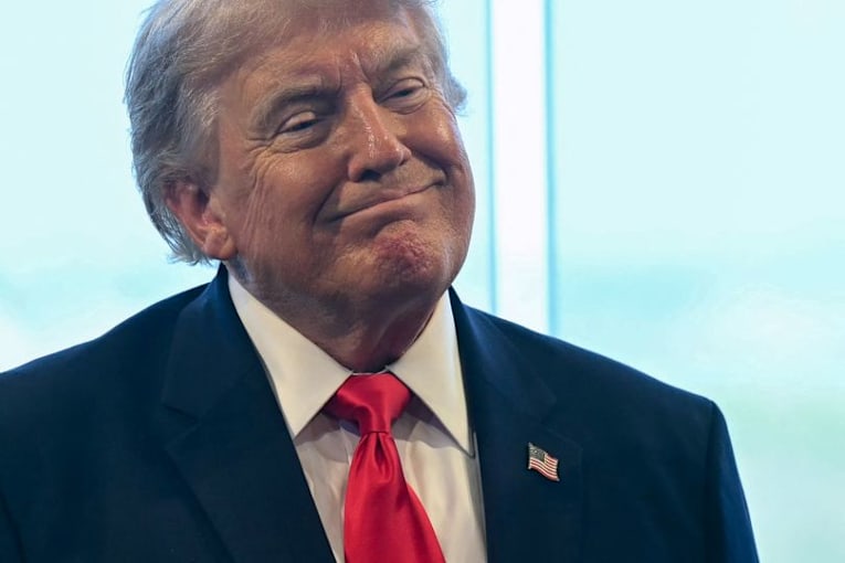 Trump slaps his signature on the $100 bill just in time for July 4th