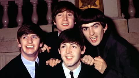Do you know the original band names of The Beatles and The Rolling Stones? See the early acts of 50 iconic musicians
