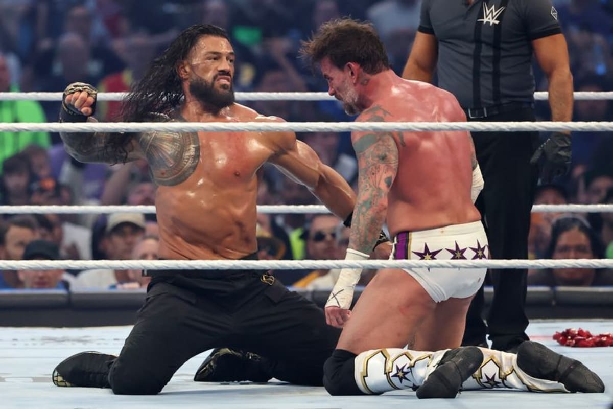 Roman Reigns' menacing mid-match words to CM Punk picked up during WWE ...