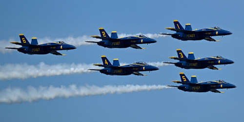 Beachgoers stunned by the Blue Angels' low-altitude flyover as viral video divides people online