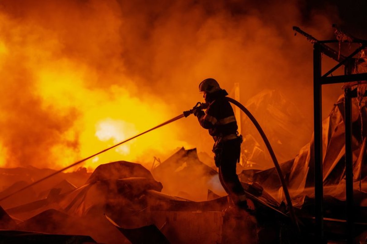 Russian missile blitz on Kyiv kills 15 and wounds 42 in 'deliberate civilian attack'