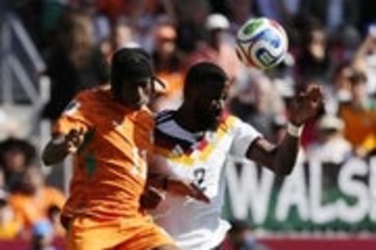 Late strike gets Germany past Ivory Coast, into knockout round