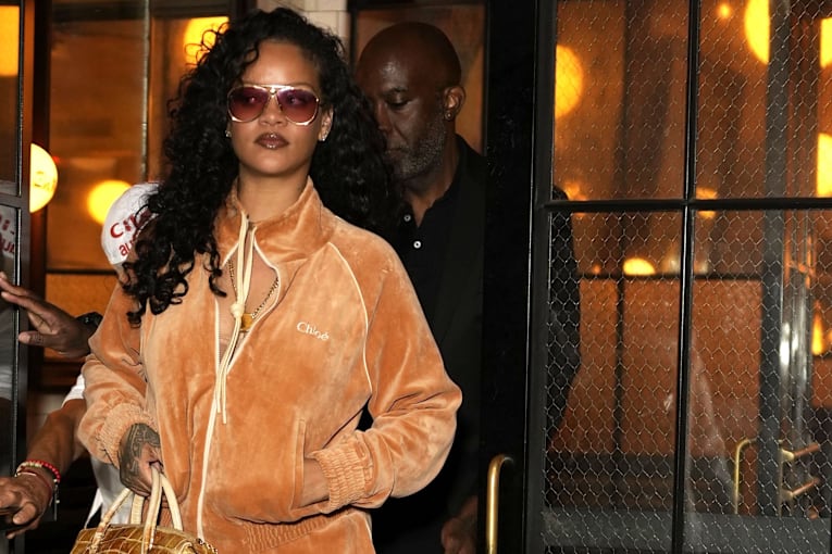 Rihanna looks straight out of the 2000s in a creamsicle Chloé tracksuit