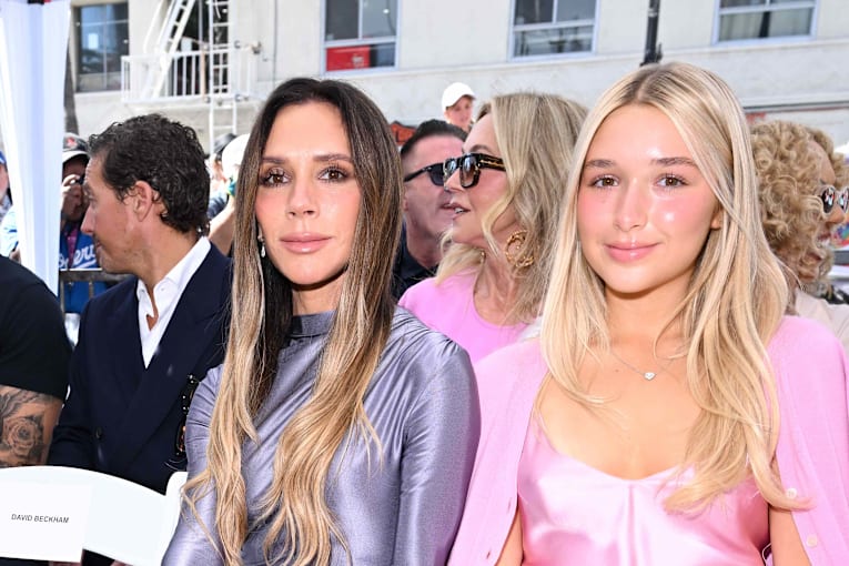 Victoria Beckham turns heads in a plunging, sheer gown while posing with lookalike daughter Harper, 15