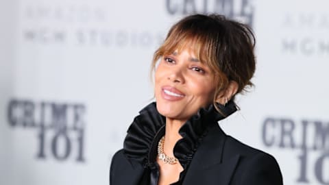 Halle Berry's plunging beach coverup made us do a double-take (and we know where she bought it)