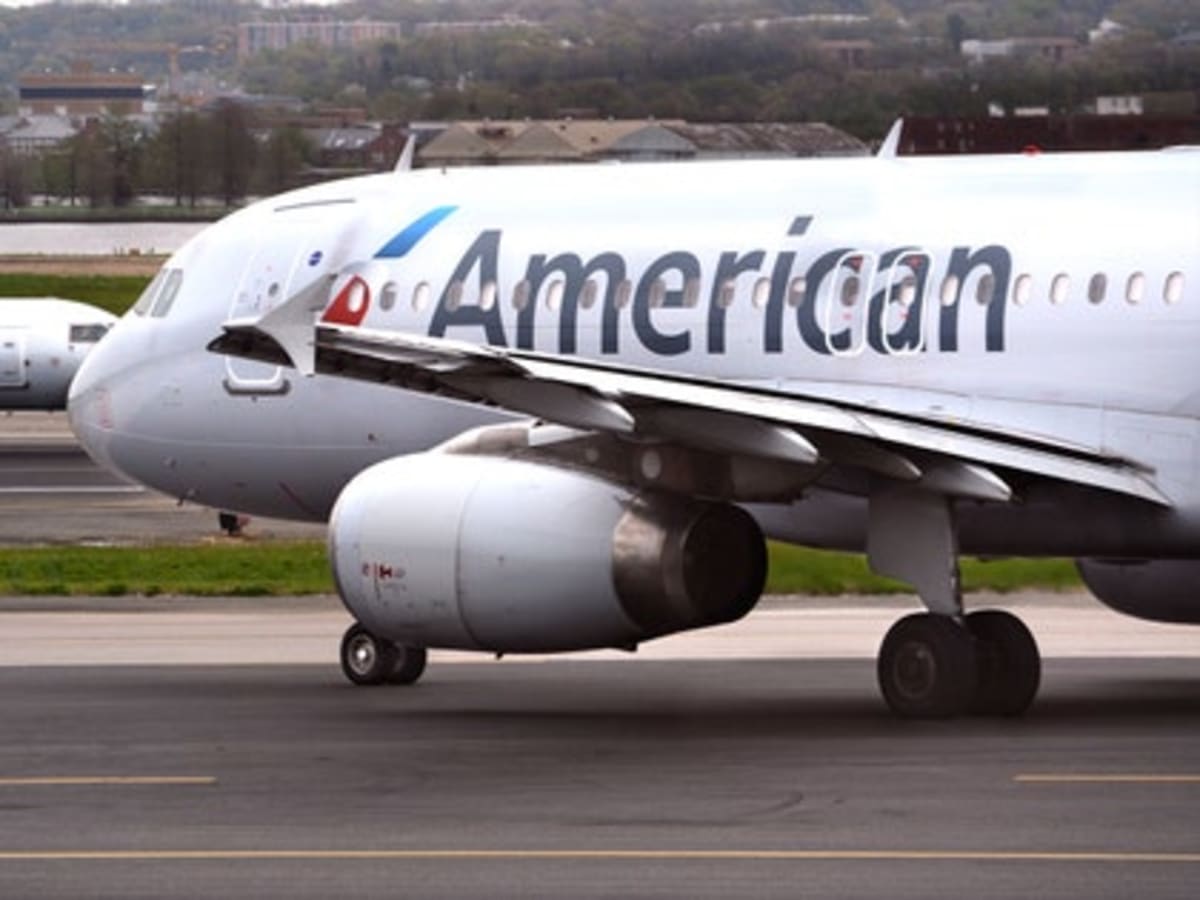American Airlines Passenger Allegedly Put Her Legs Against Window As ...