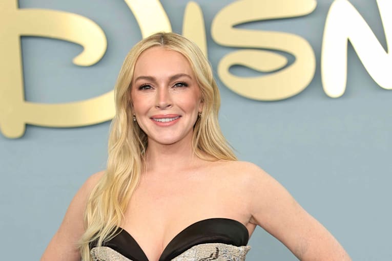 Lindsay Lohan stuns in a $3,000 strawberry minidress during a lavish yacht trip with her 3-year-old son