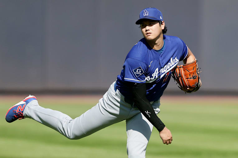 Shohei Ohtani resumes throwing after 2-week shutdown, hopes to pitch by end of regular season
