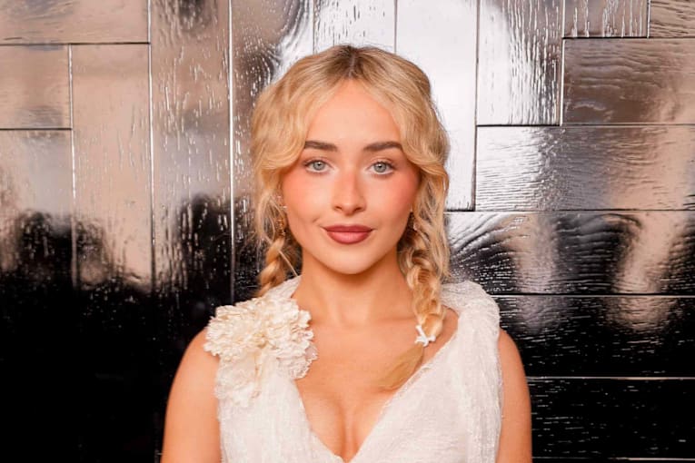 Sabrina Carpenter chills outside in nothing but lacy lingerie and heels