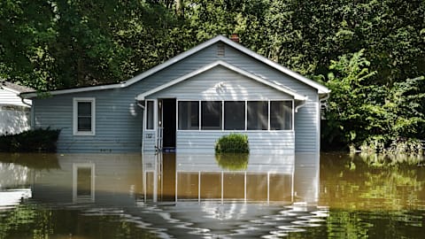 At least 7 people have died from days of heavy rain and record-setting flooding in Indiana