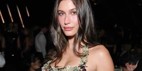 Hailey Bieber poses in nothing but head-to-toe sheer black lace