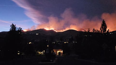Fast-moving wildfire in Nevada forces 90,000 to evacuate was human caused: sheriff