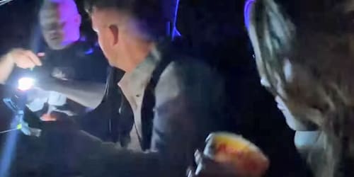 Cop pulls couple over on wedding night. Bride's 'heart sank' when he told them why