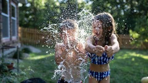 22 easy water activities for kids you can set up at home this summer
