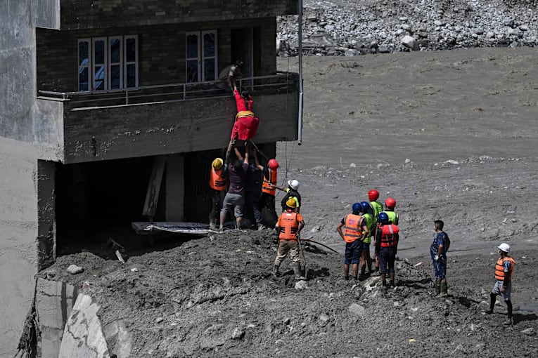 At least 63 Americans missing in Nepal-Tibet floods, officials say amid rescue op