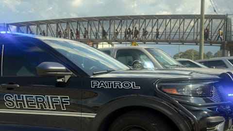 Student wounded and young suspect is in custody after shooting at Georgia high school, police say