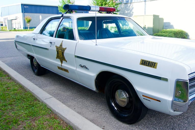 Get after them Duke boys with this Plymouth Fury Hazzard County cop car