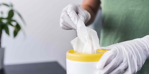 You might want to think twice before using disinfecting wipes on wood furniture