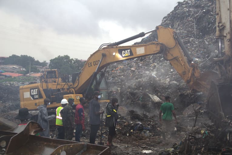A landslide at a landfill in the capital of Guinea kills 30 people, officials say