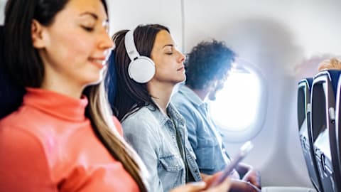 Who gets to control the airplane window shade?