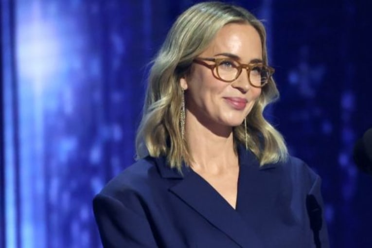 Emily Blunt's cheeky waist cutout brings a fresh, modern twist to tailored suit dressing 