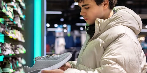 Sportswear giant closes 113 stores as shares plunge