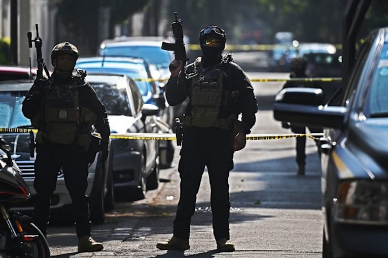 Man kills boss before biting into corpse in front of horrified witnesses