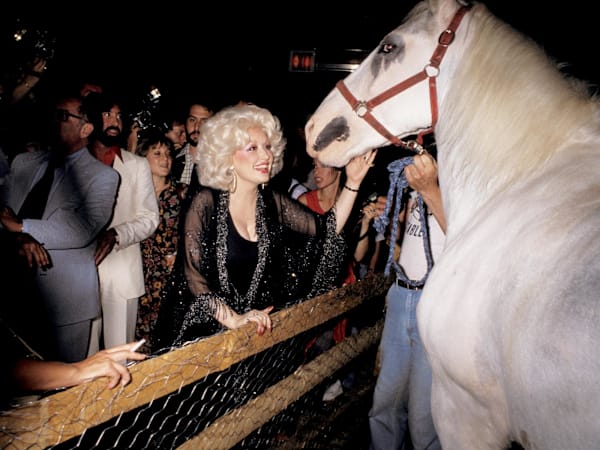 Burning flags, busty blondes and bison skulls: 48 photographs that capture America at 250