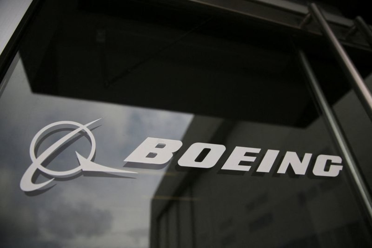 Boeing logo on a glass window at a Boeing facility