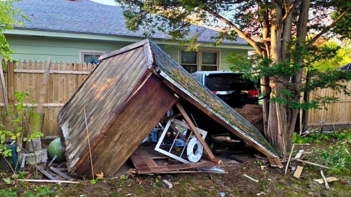 Driver hospitalized after car hits house in Springfield - AOL