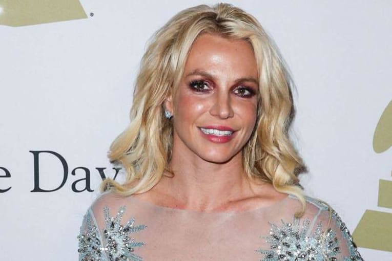 'Single as can be' Britney Spears flaunts high-slit dress for  'blind date' in video