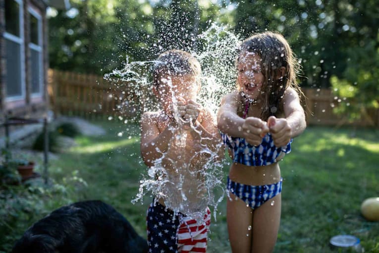 22 easy water activities for kids you can set up at home this summer