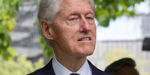 Bill Clinton takes veiled public shot at Trump for planned triumphal arch