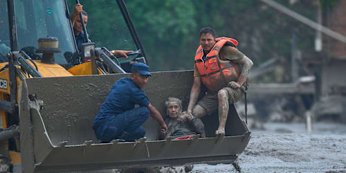At least 98 killed and hundreds missing after flash floods in Nepal and China