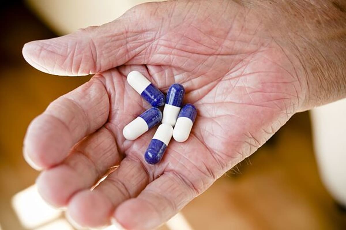 Senior with pills