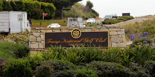 A judge suspends charges against an ex-Marine arrested on Trump's golf course with ammunition