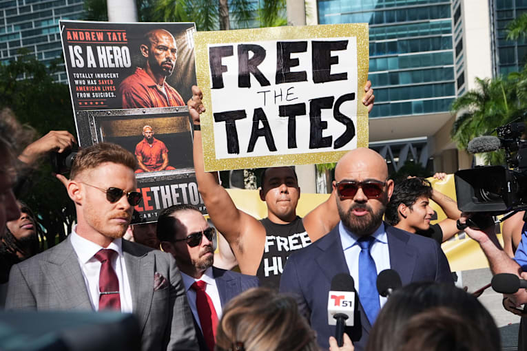 Shackled Tate brothers in court asking to be released from jail during extradition fight