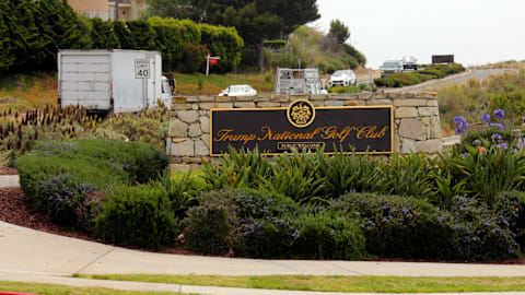 Judge suspends charges against an ex-Marine arrested on Trump's golf course with ammunition