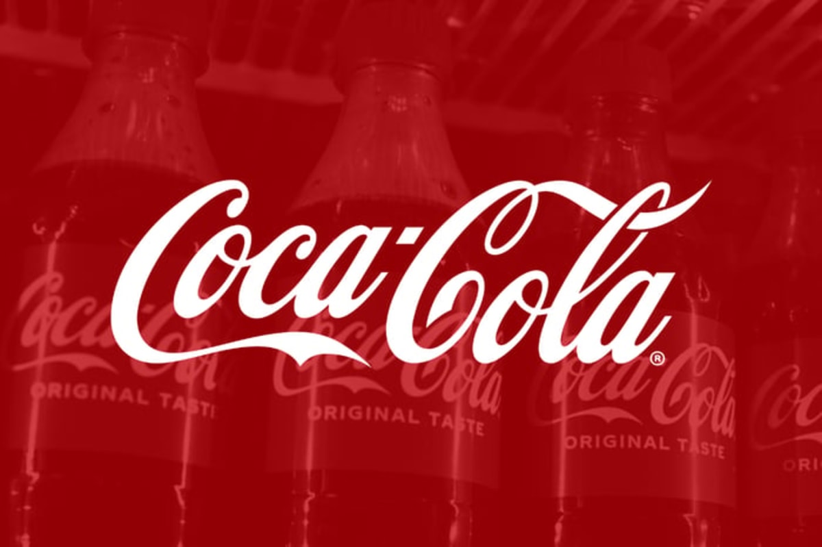 Coca-Cola logo on a red background.